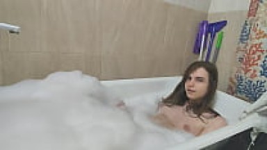 Trans girl takes bath and golden shower